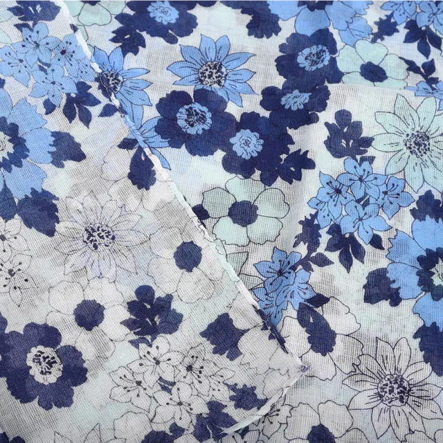 【Nina Ricci】漸層繽紛花海純綿抗UV薄圍巾(藍綠色)