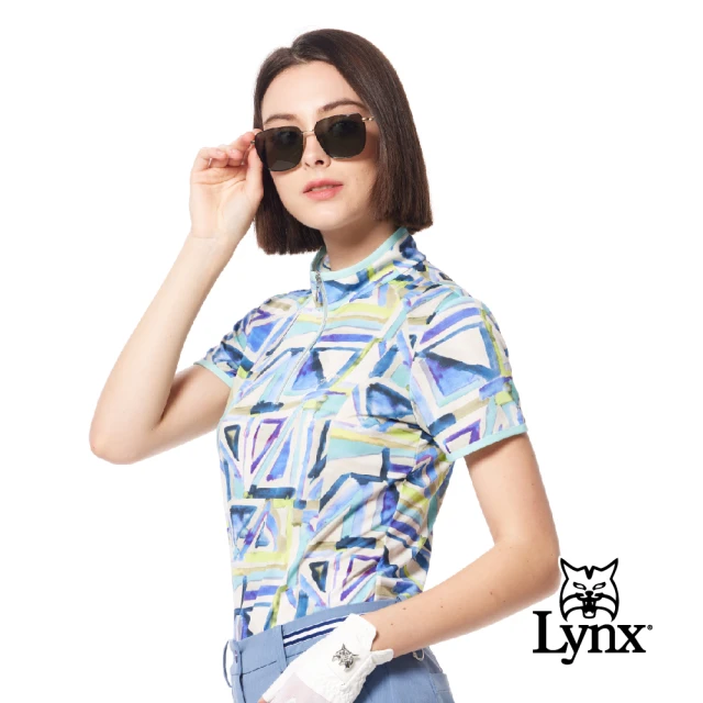 【Lynx Golf】女款歐洲進口布料柔軟舒適包邊設計滿版繽紛幾何圖形花布短袖立領POLO衫(冰藍色)