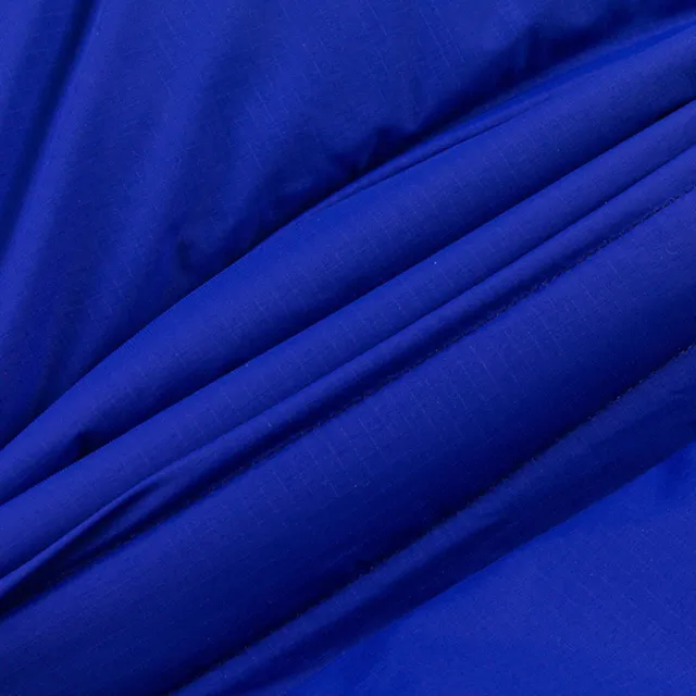 【Timberland】男款亮藍色防潑水再生羽絨派克大衣(A2N68G58)