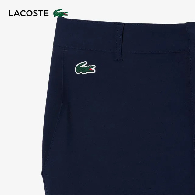 【LACOSTE】男裝-修身吸水斜紋布高爾夫球褲(海軍藍)