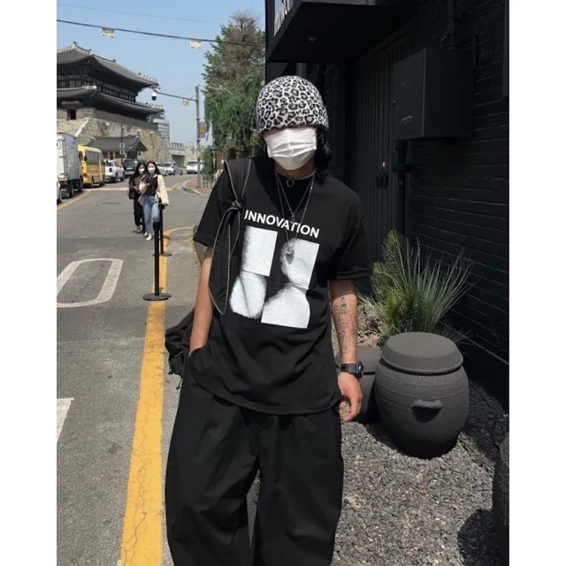 【AMERO】男女裝 圓領短袖T恤(男女裝 圓領短袖T恤 幾何圖形印花 落肩款 五分袖 情侶裝)