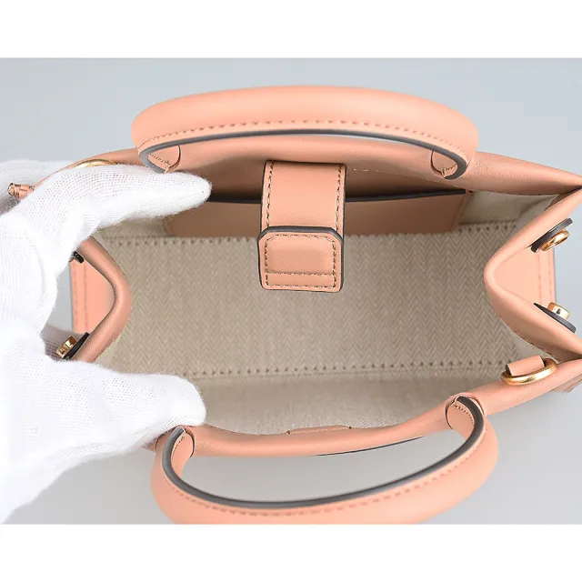【TORY BURCH】TORY BURCH ELLA BIO簡約圓形皮標LOGO設計生物基皮革吸釦式手提斜背包(迷你/沙橘)