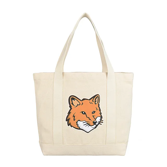 【Maison Kitsune】MAISON KITSUNE經典燙印LOGO大狐狸頭圖案設計帆布肩背托特包(自然米)