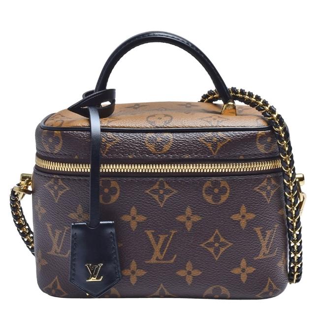 LV LOUIS VUITTON 路易威登 M45165 VANITY PM 系列 Reverse 帆布皮革飾邊女款兩用包，採用咖啡色系帆布與皮革邊飾設計，簡約時尚。內附1個內袋，拉鍊開口，配備背帶與原廠包裝盒，適合日常出勤與休閒使用。