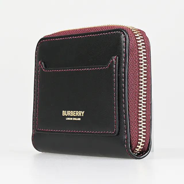 【BURBERRY 巴寶莉】BURBERRY 金字LOGO牛皮車線飾邊4卡拉鍊零錢包(黑x酒紅)