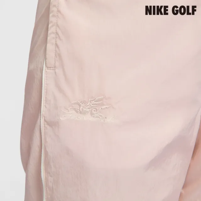 【NIKE GOLF】Nike Court Windrunner CNY 女子高腰直筒長褲 砂岩灰粉色(IQ3834-667)