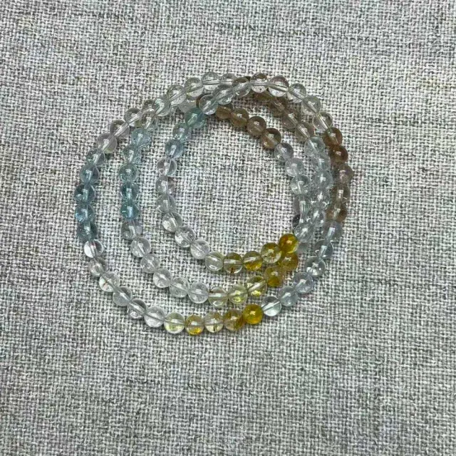 【佰財水晶珠寶】5.6mm天然透體彩托帕石三圈手串