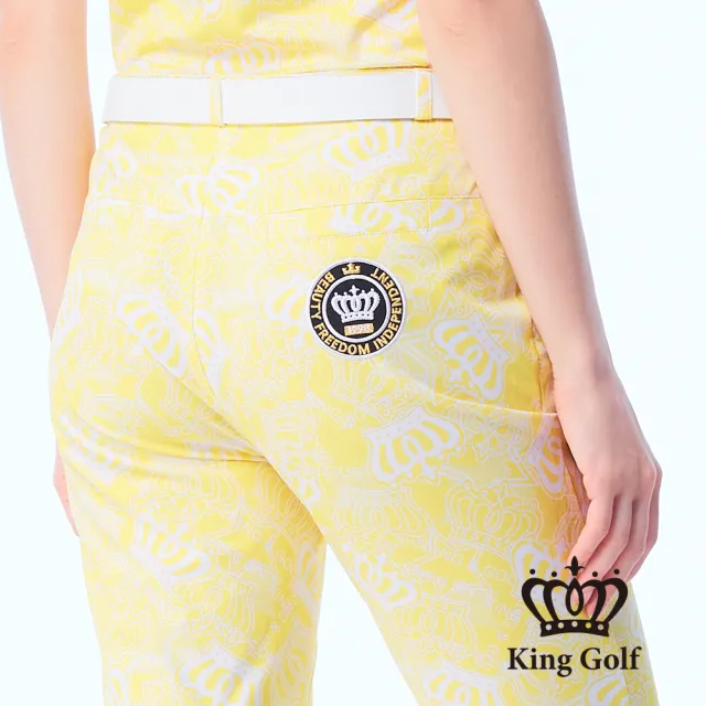 【KING GOLF】網路限定款-女款立體刺繡皇冠鋁片滿版皇冠印圖舒適素面修身休閒長褲/高爾夫球褲-黃色