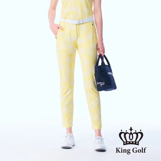 【KING GOLF】網路限定款-女款立體刺繡皇冠鋁片滿版皇冠印圖舒適素面修身休閒長褲/高爾夫球褲-黃色