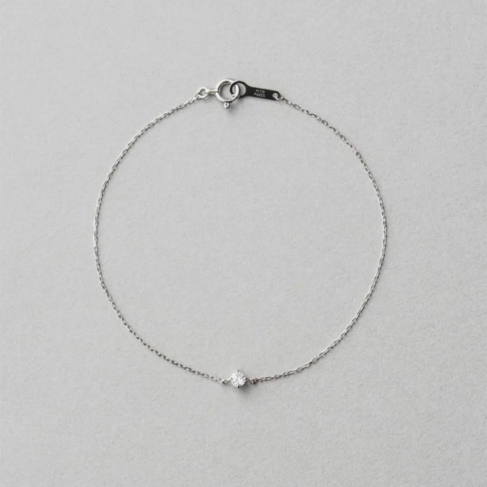【ete】PT900/850 經典單鑽爪鑲鑽石手鍊-0.10ct(鉑金色)
