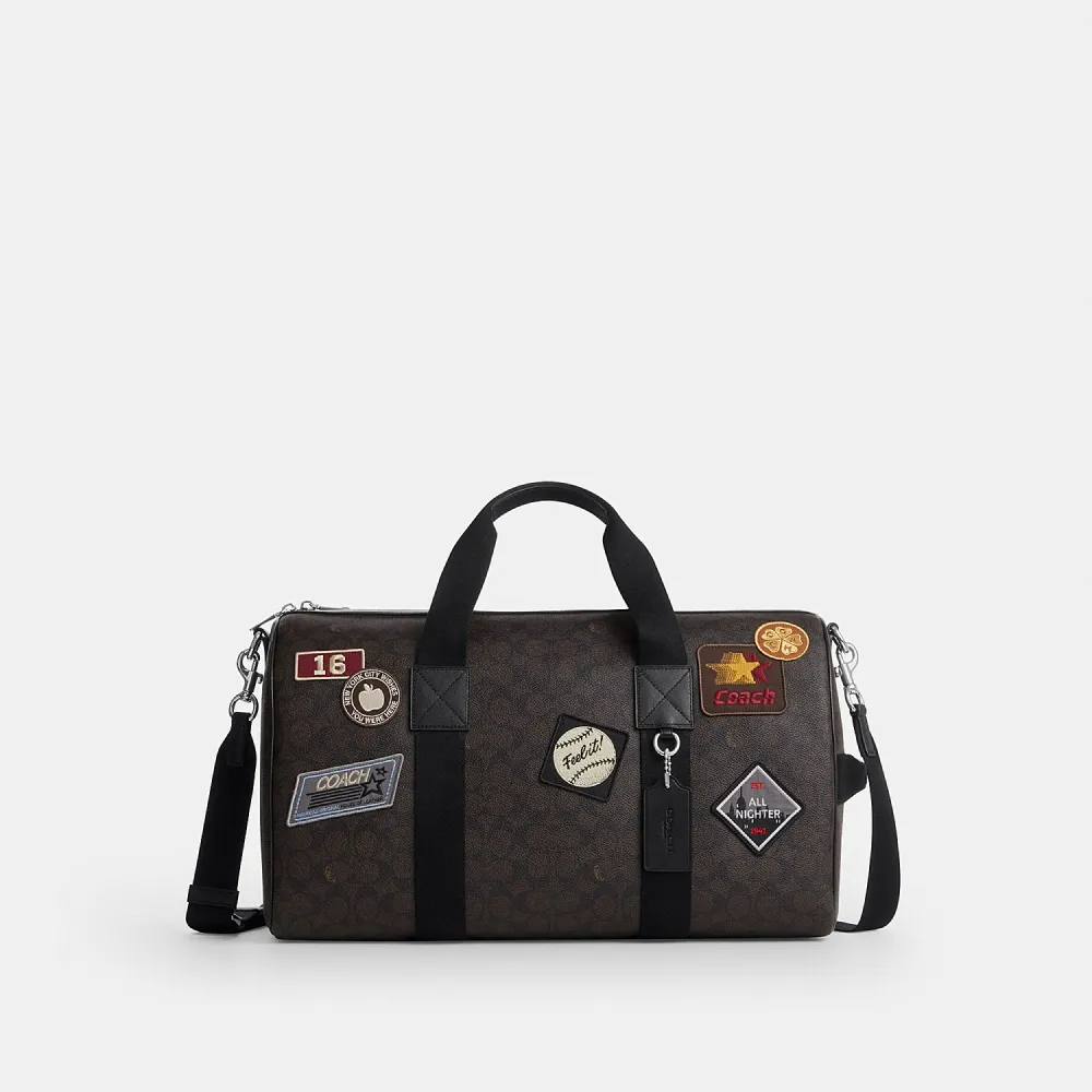 【COACH】蔻馳官方直營 EXPLORER 45 經典 SIGNATURE 貼飾行李袋 旅行袋 斜背包-SV/核桃棕色/黑色(CGA25)