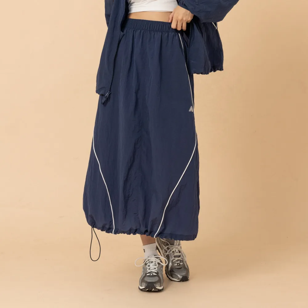 【NEW BALANCE】NB 滾邊抽繩尼龍長裙_WB61D2OPNNY_女性_深藍色(美版 版型偏大)